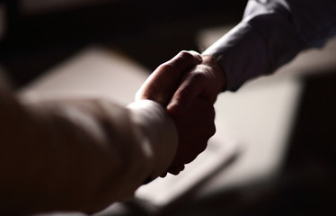 close up.handshake of two business people.