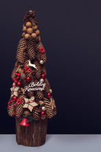 Dark Pine Cone Christmas Tree Decoration Wallpaper With Hungarian Message Merry Christmas Boldog Karacsonyt, Holiday Background