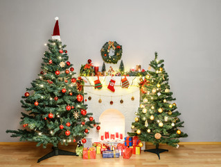 decorated fireplace and christmas tree