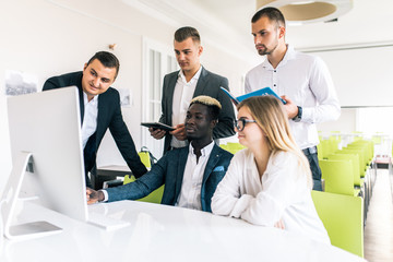 Multi ethnic business team having meeting or presentation in modern office