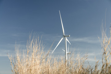 Wind generator farming in dreen world energy concept in vintage tone