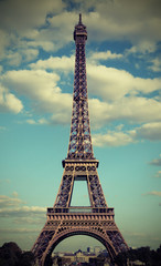 Wall Mural - Eiffel Tower in Paris France with white clouds with photograph e