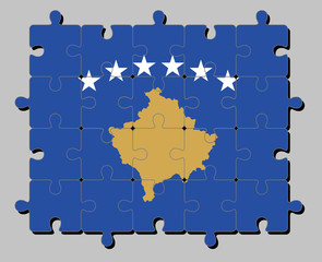 jigsaw puzzle of kosovo flag in a blue field charged with a map of kosovo in gold, surmounted by an 
