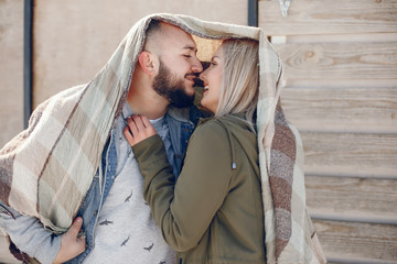 Elegant couple in a winter park