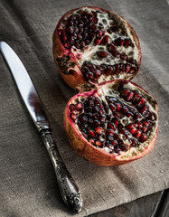 Wall Mural - Red juicy ripe pomegranate. Winter fruits