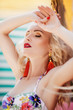© Forewer - Portrait of beautiful young blonde  woman with makeup in swimming suit