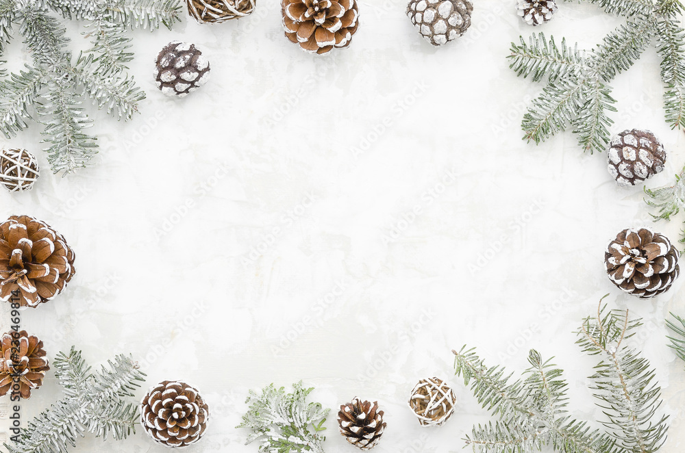 Christmas creative frame made of cones and fir branches on white ...