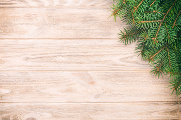 Wall Mural - Christmas gray wooden background with fir tree and copy space vintage, toned. top view empty space for your design