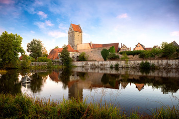 Poster - Historic old town of Dinkelsbuhl, reflecting in the river. landmark at the romantic road middle Franconia, Germany