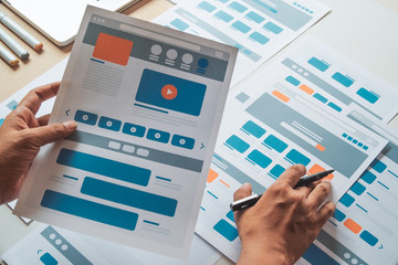 Website designer Creative planning application developer development draft sketch drawing template layout prototype framework wireframe design studio . User experience concept .