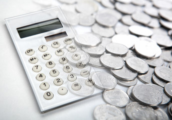 Wall Mural - white calculator with russian ruble coins close up