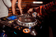 © Семен Саливанчук - Dj mixes the track in the nightclub at party