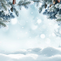 Wall Mural - christmas winter background with snow and blurred bokeh.merry christmas and happy new year greeting 