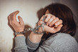 Woman with chained hands. Stop violence against Women. International women's day.