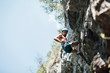 © Marko Milovanovi_/Stocksy - Young man climbing