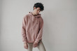 © Sergey Filimonov/Stocksy - Stylish young man in hoodie