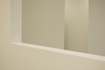 beige walls and shadows of empty space. abstract composition.