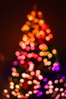 © Gillian Vann/Stocksy - xmas lights blur in neon bright colours