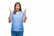 © Krakenimages.com - Young asian doctor woman over isolated background crazy and mad shouting and yelling with aggressive expression and arms raised. Frustration concept.
