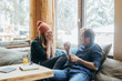 © Lumina/Stocksy - Couple Enjoying Winter Vacation in Mountain