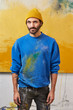 © ALTO IMAGES/Stocksy - Male Painter In Messy Casuals Against Painting In Studio