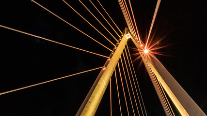 Wall Mural - illuminated central pylon of cable suspension bridge