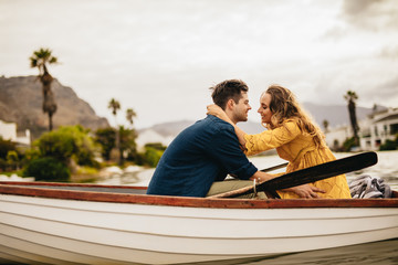 Wall Mural - Romantic couple in love on a boat date