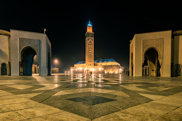 CASABLANCA, MOROCCO - NOVEMBER 15, 2018: Night view of Mosque of Hassan II in Casablanca. The Hassan II Mosque is the largest mosque in Morocco, the second largest in Africa, and the 5th largest in th