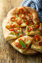 Wall Mural - Tomato focaccia with fresh basil