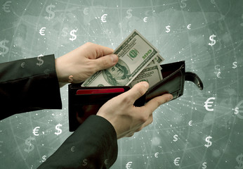 Wall Mural - Businessman's hand takes out dollar from a wallet with global and exchange graphic