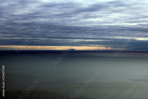Mare Al Tramonto Con Isola All Orizzonte E Cielo Plumbeo Buy This Stock Photo And Explore Similar Images At Adobe Stock Adobe Stock