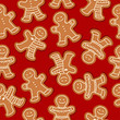 Festive Christmas seamless pattern with gingerbread men