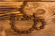 Cup shaped coffee beans on wooden table. Top view