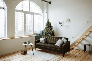 Wall Mural - Bright living room with large Windows and Christmas tree decorated for Christmas