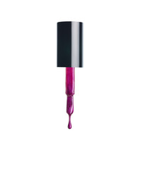 nail polish brush with a dripping drop