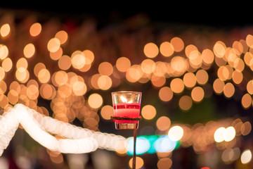 abstract blur candles with lights bokeh background.