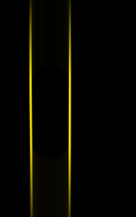 vertical motion blur two yellow lights on black background