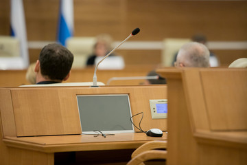 Session of Government. Conference room or seminar meeting room in business event. Academic classroom training course in lecture hall. blurred businessmen talking. modern bright office indoor