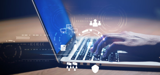 Wall Mural - close up businessman hand typing or working on laptop for programming about cyber security , advance