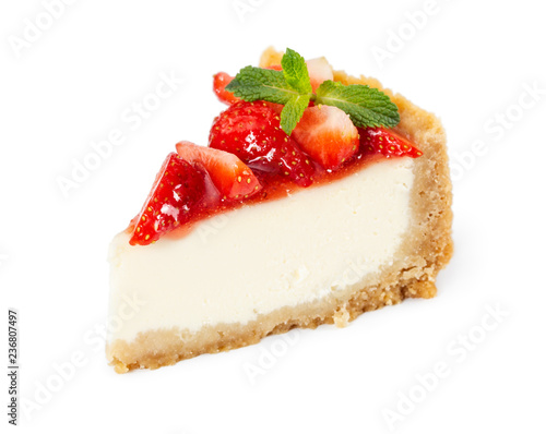 Fotografering  Piece of cheesecake with fresh strawberries and mint
