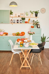 autumn kitchen decoration with pumpkins