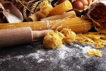 pasta. Fresh homemade pasta with pasta ingredients on the rustic table.