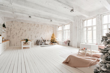 Wall Mural - Light living room with Christmas tree. Comfortable sofa, high large Windows. Light white brick wall.