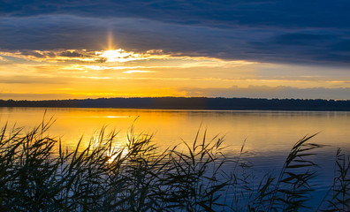 Wall Mural - Sunrise over the lake.