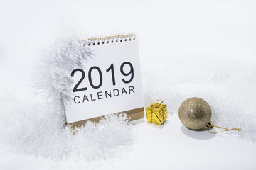 Wall Mural - Christmas decoration on white background. Table paper Calendar of Year 2019