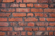  The texture is a wall of old red brick.