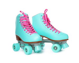 Wall Mural - pair of bright stylish roller skates on white background