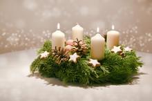 Third Advent - Decorated Advent Wreath From Fir And Evergreen Branches With White Burning Candles, Tradition In The Time Before Christmas, Warm Background With Festive Bokeh And Copy Space