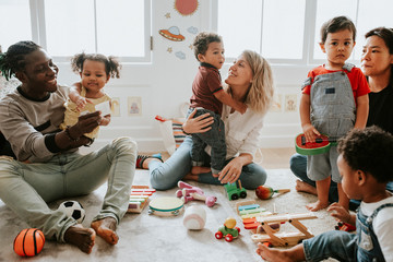 diverse children enjoying playing with toys