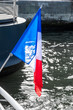 French flag on a boat.